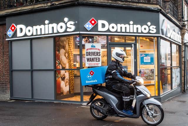 Domino’s Pizza has posted a rise in annual profits and said it expects sales growth to ramp up in 2022 despite inflation and recruitment woes.