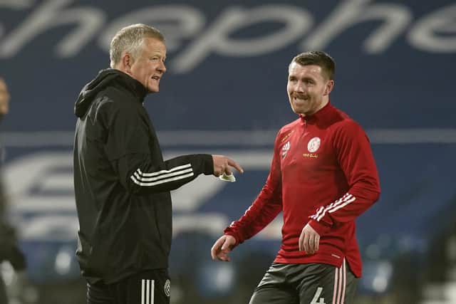 Chris Wilder, pictured during his time at Sheffield United with midfielder  John Fleck. Picture: Andrew Yates/Sportimage
