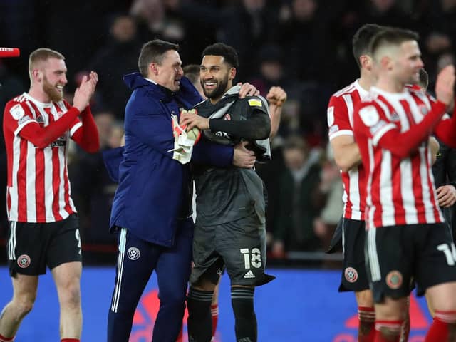 GOOD TIMES: Sheffield United goalkeeper Wes Foderingham celebrates with manager Paul Heckingbottom  Picture: Simon Bellis/Sportimage