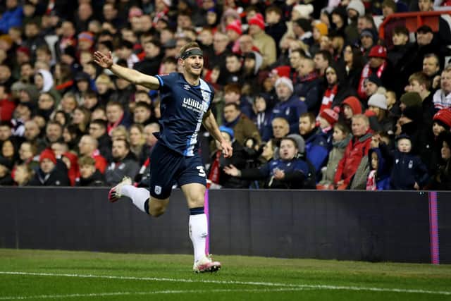 Huddersfield Town's Tom Lees celebrates scoring the opening goal during the Emirates FA Cup fifth round match at the City Ground (Picture: Isaac Parkin/PA Wire.)