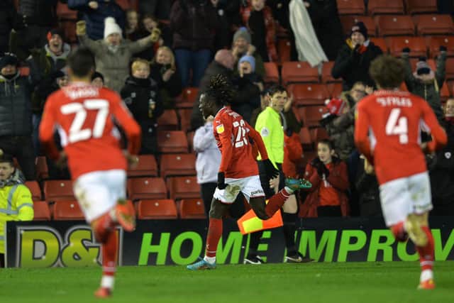 Domingos Quina celebrates his opener for Barnsley against Stoke. Picture: Bruce Rollinson.