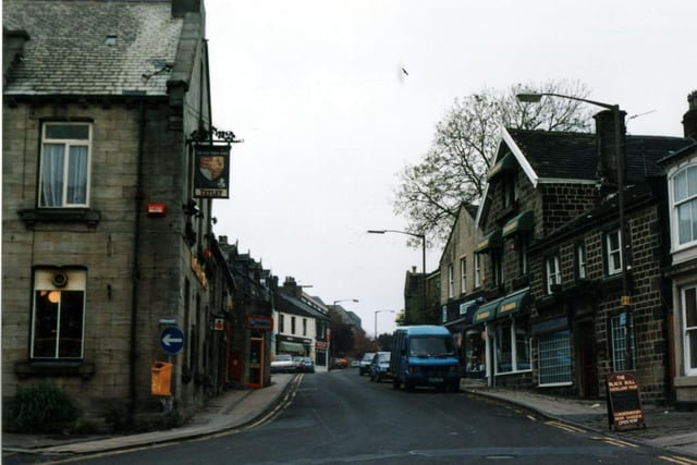 Horsforth Town Street from The Green. On the left is the Old Kings Arms public house. To the extreme right is the Black Bull public house, first granted a license in 1758, named the Black Bull in 1803. In later years it was famed for having a bowling green.