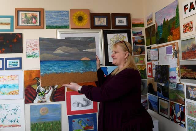 Debs Teale with some of her artwork.