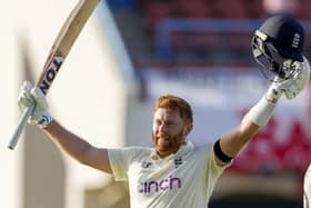 He's ton it: Jonny Bairstow's bat says it all as the Yorkshireman celebrates his century against the Windies.
(AP Photo/Ricardo Mazalan)