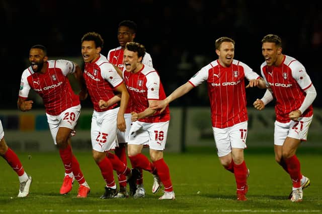 Rotherham United players celebrate after winning during the Papa John's Trophy semi-final. Pictures: PA