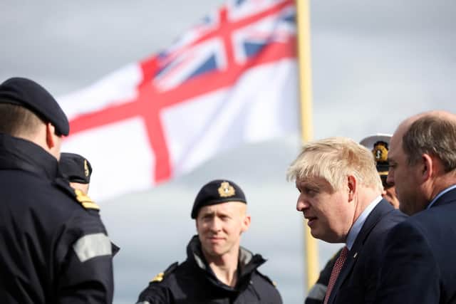 Boris Johnson during a visit to Merseyside on Thursday - Labour peer David Blunkett believes the Ukraine crisis will save the Tory leader's premiership.