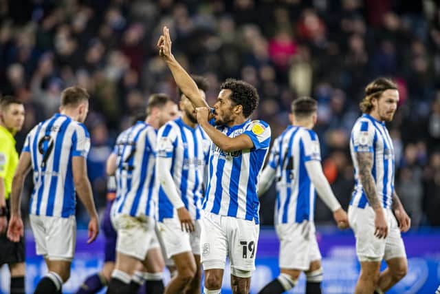 Huddersfield Town’s new dad Duane Holmes enjoys a thumb-sucking celebration after scoring against Derby last month. Picture: Tony Johnson
