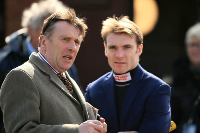 Racing legend Peter Scudamore with his son Tom at Cheltenham in 2016, the year Scudamore junior won the Stayers' Hurdle on Thistlecrack.