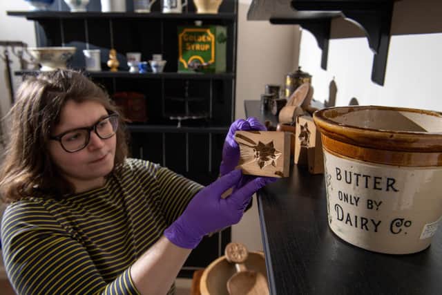 Silent Footsteps; explore untold stories of domestic service at Kiplin Hall and Gardens. Pictured is curator Alice Rose with butter molds. Picture Bruce Rollinson