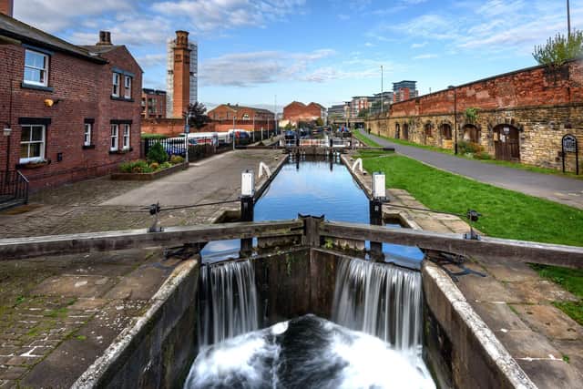 The wooden lock gates on the Aire and Calder navigation canal with a view of the West Yorkshire town of Sowerby Bridge
Picture PHILIP_OPENSHAW