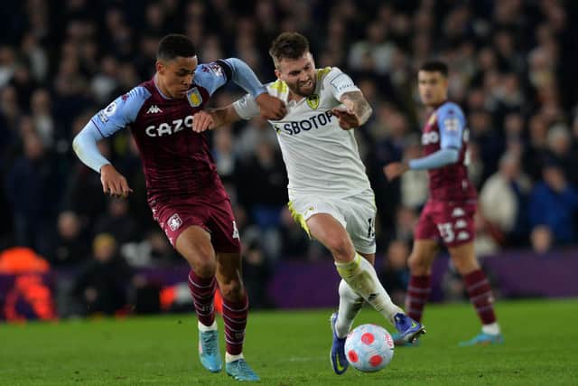 The experience and the awareness of Leeds 
United's Stuart Dallas, seen battling with Aston Villa's Jacob Ramsey, will be crucial for the Whites during the run-in 
Picture: Jonathan Gawthorpe