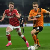 Hull City's Greg Docherty, right, battles with Bristol's George Tanner 
Picture: Jonathan Gawthorpe