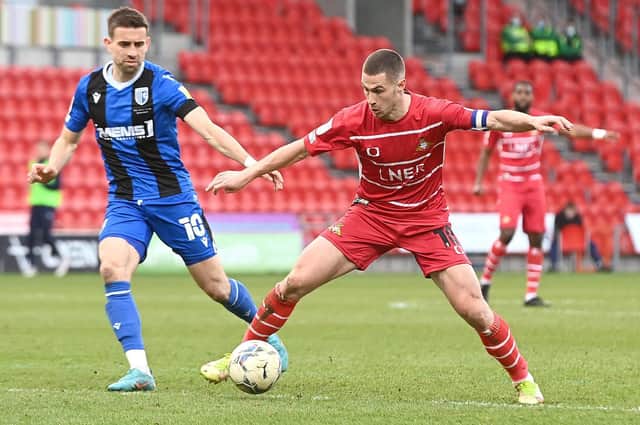 LEADER: Tommy Rowe did his best to drag Doncaster Rovers through