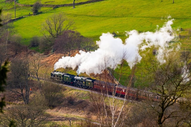 LMS Class Royal Scot No.46100, and the London Midland & Scottish Railway 5XP Jubilee Class 4-6-0 No.45596 Bahamas heading back towards Oxenhope Station.