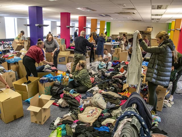 Volunteers at Dean Clough Mills in Halifax sort through donations and box up vital clothing and toiletries to aid Ukrainian refugees. Photo: Tony Johnson.