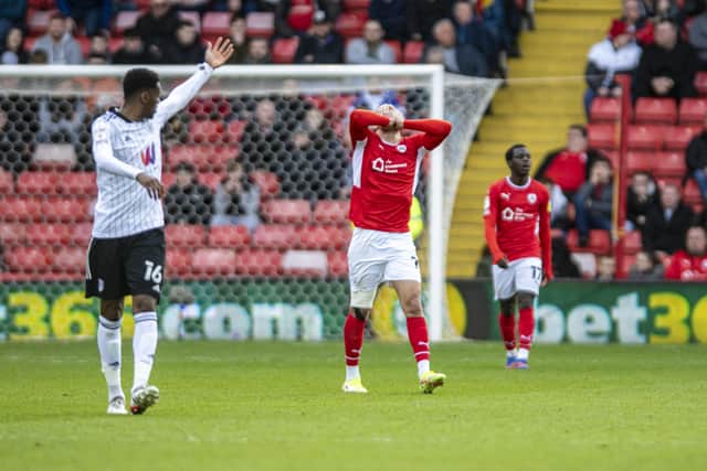 AGONY: Carlton Morris shows his frustration after Barnsley conceded a goal against Fulham. Picture: Tony Johnson.