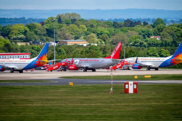 Planes lined up airport apron at Leeds Bradford International Airport, Leeds.
Pic: James Hardisty.
