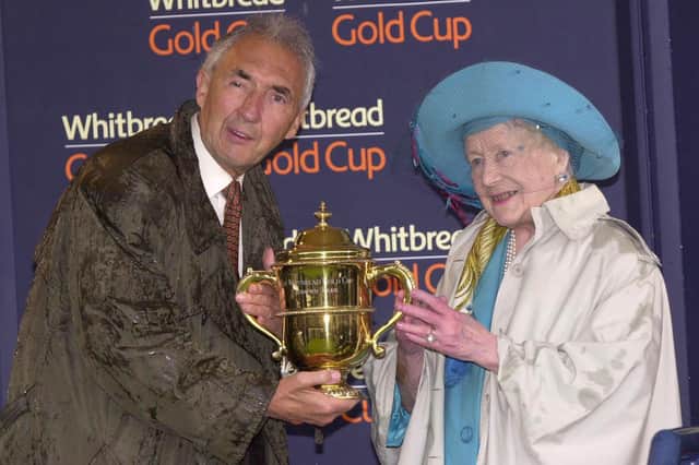 The Queen Mother presenting the 45th Whitbread Gold Cup to Robert Ogden, the owner of Ad Hoc at Sandown in 2001. Picture: Tim Ockenden
