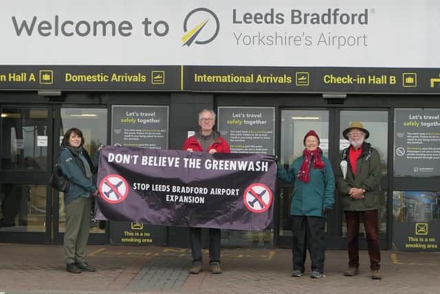 Campaigners from Group for Action on Leeds Bradford Airport (GALBA) protesting outside the airport
