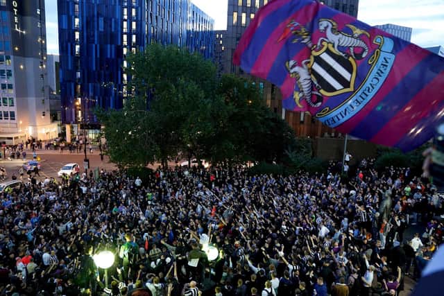 Newcastle United fans celebrated the takeover of their club by the Saudi Arabia Public Investment Fund (PIF).