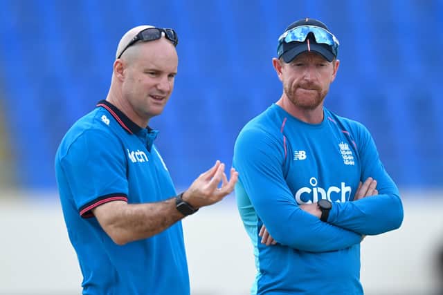 England coach Paul Collingwood  speaks with director of cricket Sir Andrew Strauss during a nets session in Antigua. (Photo by Gareth Copley/Getty Images)