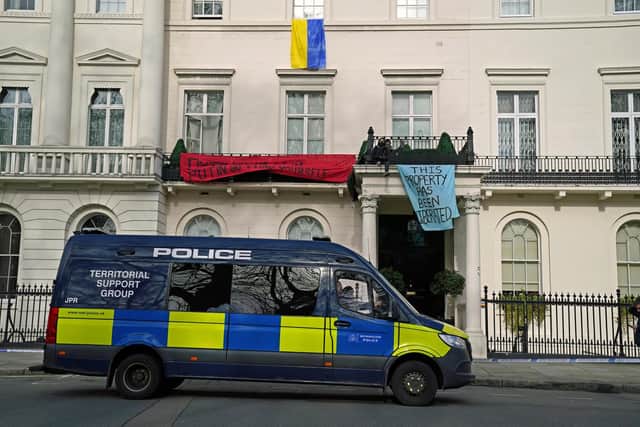 A Metropolitan Police Territorial Support Group (TSG) van watches over a group of squatters occupying a mansion belonging to Russian oligarch Oleg Deripaska in Belgrave Square, central London. Mr Deripaska, who has stakes in energy and metals company En+ Group, is one of the seven Russian oligarchs with business empires, wealth and connections that are closely associated with the Kremlin who have been sanctioned by the UK Government.