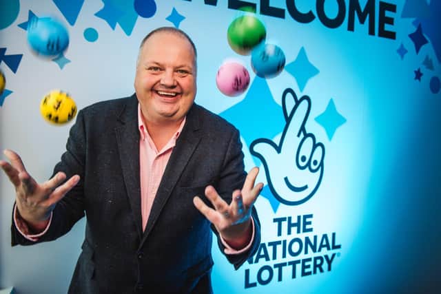 Undated handout photo issued by Camelot of the National Lottery of Andy Carter, senior winners' adviser at The National Lottery.
