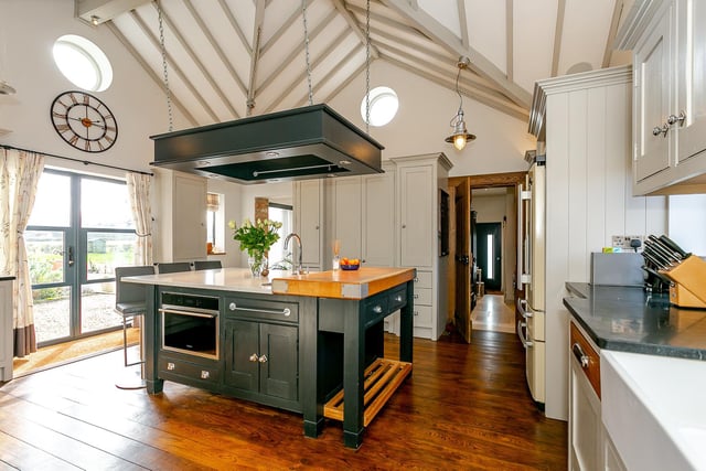 The period farmhouse kitchen has been beautifully updated keeping the original features