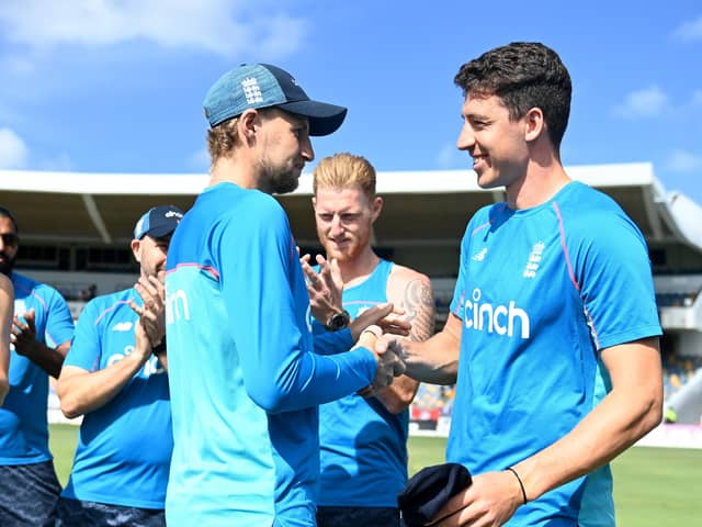 YOU'RE IN: Yorkshire's Matthew Fisher of England is presented with his test cap by captain Joe Root ahead of day one of the 2nd test match between West Indies and England at Kensington Oval in Barbados. Picture: Getty Images.