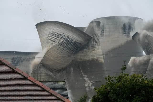 Four of the iconic cooling towers at the Ferrybridge C Power station are demolished on October 13, 2019, in Knottingley. (Pic credit: Ian Forsyth / Getty Images)