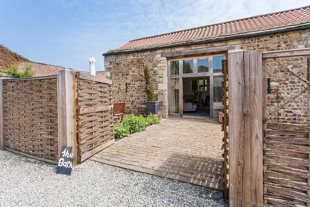 The converted barn is now a three-bedroom holiday let