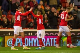 Barnsley striker Carlton Morris celebrates his opener against Bristol City on Tuesday night with Remy Vita. Picture: Bruce Rollinson.
