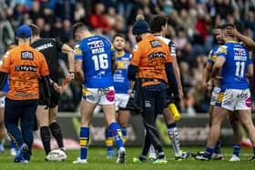 FLASHPOINT: Referee Chris Kendall shows the red card to Leeds Rhinos James Bentley (far right) against Warrington Wolves  Picture: Tony Johnson