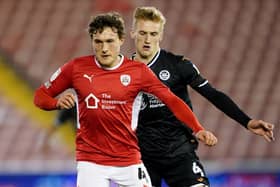 Barnsley's Callum Styles in action with Swansea City's Flynn Downes. Picture: PA.