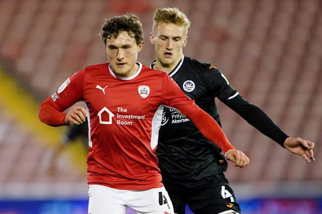 Barnsley's Callum Styles in action with Swansea City's Flynn Downes. Picture: PA.