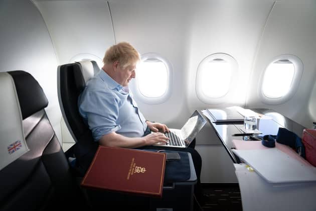 Prime Minister Boris Johnson returning from Saudi Arabia on Thursday March 17, 2022. Pic: Stefan Rousseau/PA Wire.