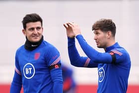 England's Harry Maguire and John Stones (right) during a training session at St George's Park Picture:  Nick Potts/PA