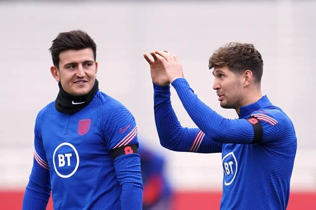 England's Harry Maguire and John Stones (right) during a training session at St George's Park Picture:  Nick Potts/PA