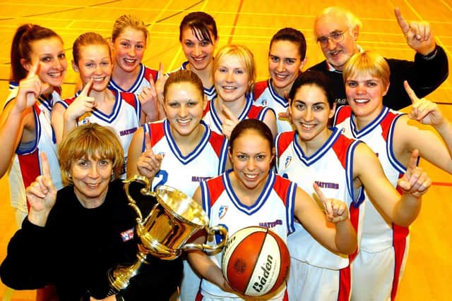 Sheffield Hatters with the National Conference Basketball League trophy..BR LtoR. Kim Hinchliffe,Molly Lafferty,Kirsty Lavin,Kate Loftus, Frankie Morton,Andrea Kagie,Neal Lovell(Ass Coach). FR LtoR. Betty Codona(Coach),Lisa Hutchinson,Sarah Winter,Rada Pavichevich,Anna Hay (Picture: Steve Ellis)