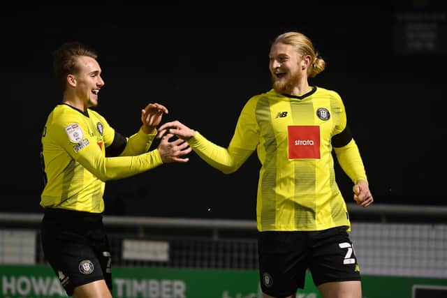 Luke Armstrong, right, will be suspended for Harrogate Town's clash at home to Walsall after his midweek sending off at Tranmere Rovers 
Picture: Bruce Rollinson