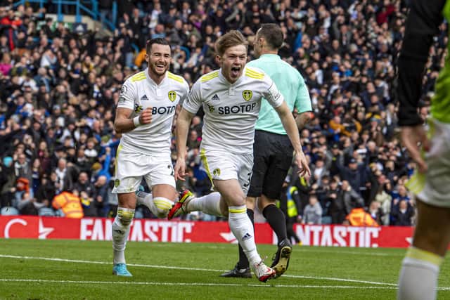 Jack Harrison chases Leeds United team-mate Joe Gelhardt celebrating his late late winner against Norwich City. Picture: Tony Johnson