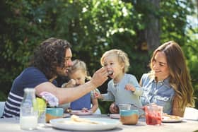 Joe Wicks new book is aimed at healthy eating for the entire family. Pictured with wife Rosie, daughter Indie and son Marley
Picture Dan Jones