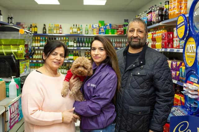 Harpreet with her parents, Jas and Pete, at their Waring Green store