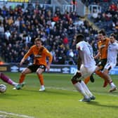 OPENER: Luton Town's Elijah Adebayo scores the opening goal during the Sky Bet Championship match at the MKM Stadium. Picture: Nigel French/PA Wire.