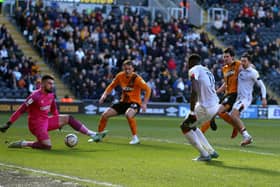 OPENER: Luton Town's Elijah Adebayo scores the opening goal during the Sky Bet Championship match at the MKM Stadium. Picture: Nigel French/PA Wire.