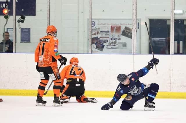 Jack Brammer, right, celebrates his first period power play strike to put Sheffield Steeldogs 2-1 ahead against Telford Tigers at Ice Sheffield Picture courtesy of Peter Best