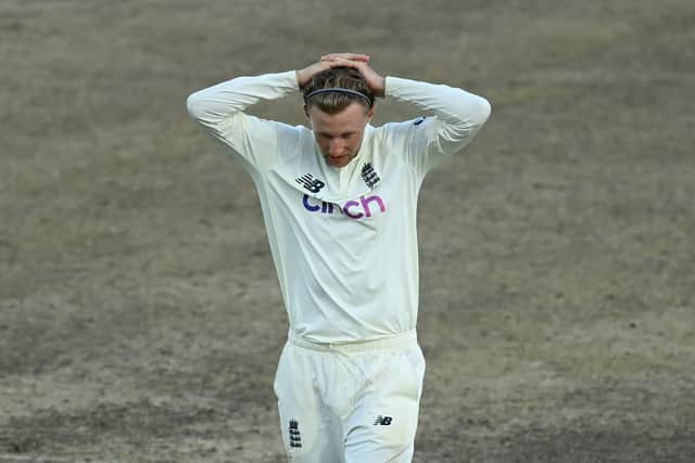 FRUSTRATION: England captain Joe Root holds his head during day five  at the Kensington Oval in Bridgetown, Barbados Picture: Gareth Copley/Getty Images