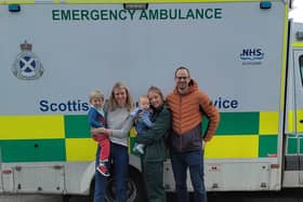 Max (left), Alex Clayton (centre-left), Fraser (centre) and Tony Hayward (right) meeting up with ambulance service call handler Lorna Milward (centre-right), who helped deliver baby Fraser when he was born prematurely while they holidayed in Scotland