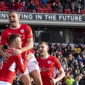 Barnsley leaders: Mads Andersen celebrates scoring against Middlesbrough with Carlton Morris and Michal Helik. (Picture: Tony Johnson)