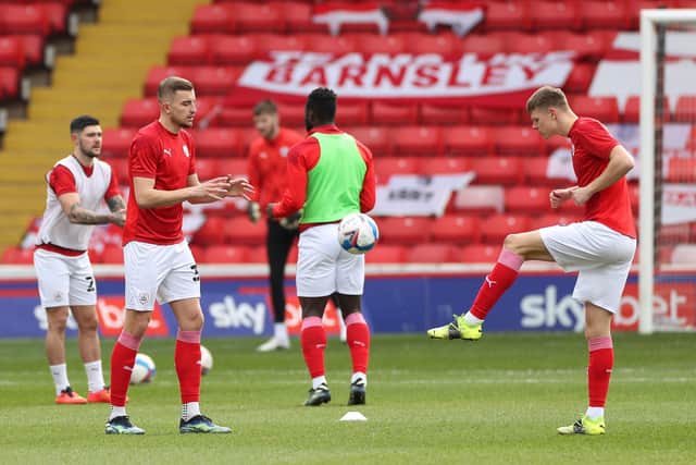 Barnsley's Michal Helik (left) and Mads Andersen warm-up before the Sky Bet Championship match at Oakwell (Picture: PA)